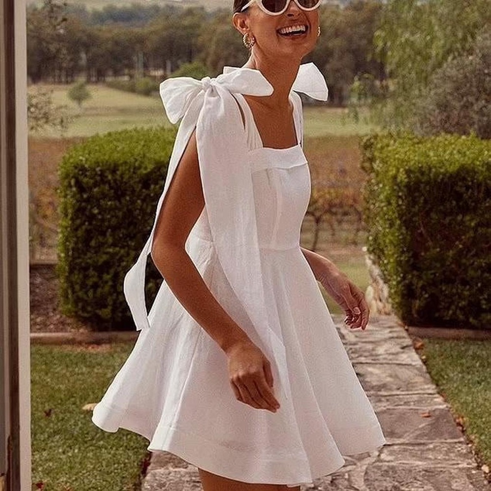 DISSH Aisle White Linen Bow Mini Dress
